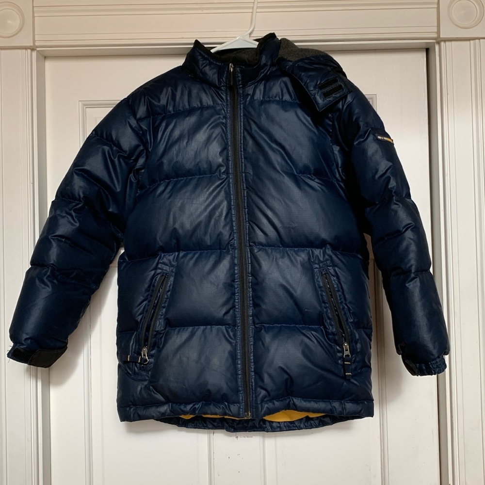 goose down winter jacket. Has zippered pockets inside and out, removable hood
